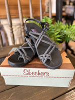 Skechers “Reggae - Perfect Duo” in Black